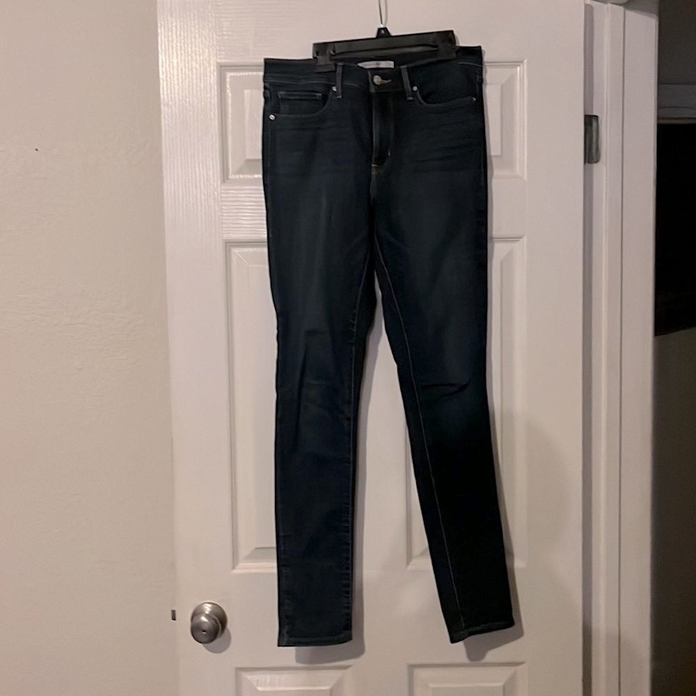 Dark wash Levi’s 311 shaping skinny jeans. Almost new, used a handful of times.